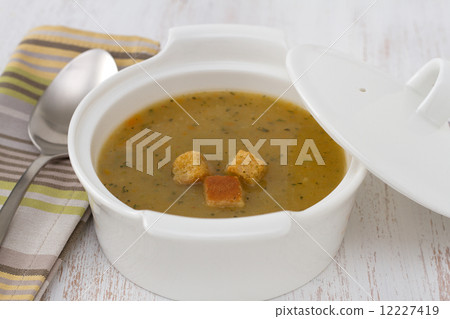 vegetable soup in the bowl and spoon vegetable soup in the bowl and spoon 12227419