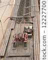 A view from above of an electric train with a red contact electrical supply network in Russia 12227700