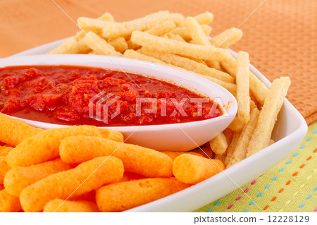Potato, corn chips and red sauce Potato, corn chips and red sauce 12228129