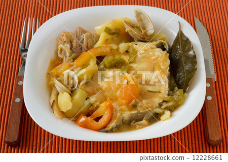 fish stew in the white plate fish stew in the white plate 12228661