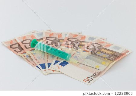 Drug trafficking, syringe, Euro bills Drug trafficking, syringe, Euro bills 12228903
