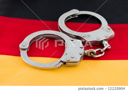 Handcuffs on German Flag 12228904