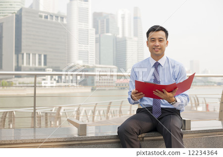 Business executive in a financial district.  12234364