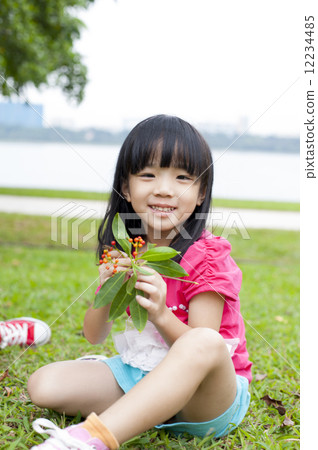 Girl exploring in the park. 12234485