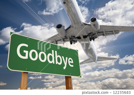 Goodbye Green Road Sign and Airplane Above Goodbye Green Road Sign and Airplane Above 12235683