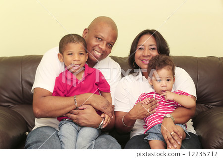 Portrait of gorgeous african family. Focus on the mother and the 12235712