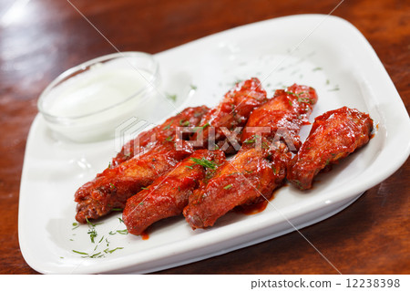 Chicken wings with sauce Chicken wings with sauce 12238398