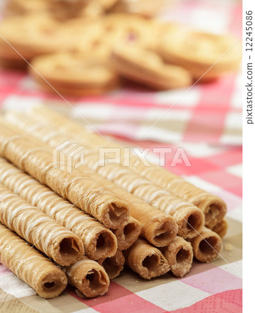 Sweet tubules on a table 12245086