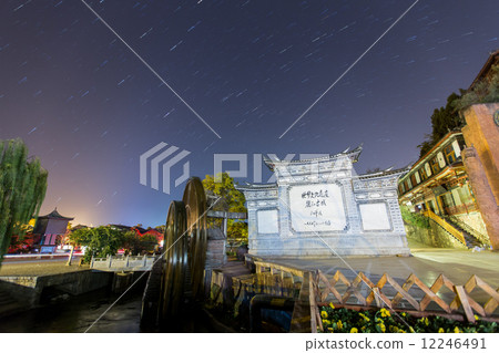 Beautiful Night scene of the waterwheel in Lijiang old town , Yunnan China. 12246491