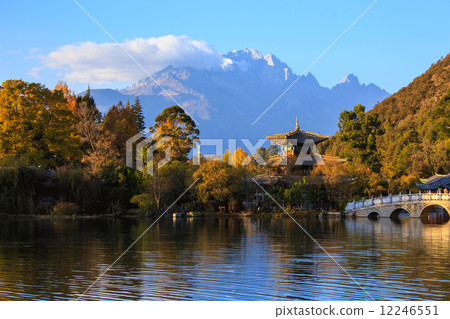 Lijiang old town scene-Black Dragon Pool Park. . In the there, you can see Jade Dragon Snow Mountain 12246551