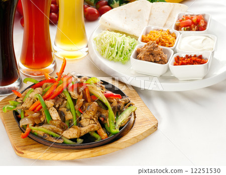 original fajita sizzling hot  on iron plate 12251530