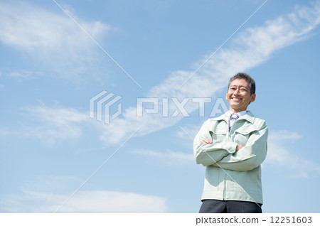 Middle aged man in work clothes 12251603