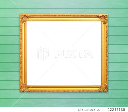 blank golden frame on wood wall 12252186