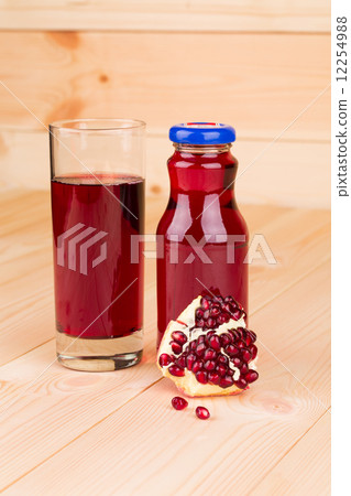 Bottle of pomegranate juice Bottle of pomegranate juice 12254988