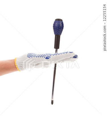 Hand in glove holding screwdriver. Hand in glove holding screwdriver. 12255154