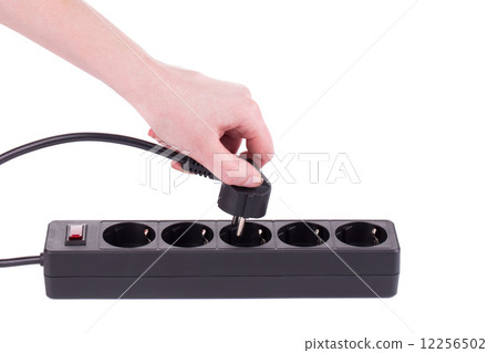 Hand puts the plug 12256502