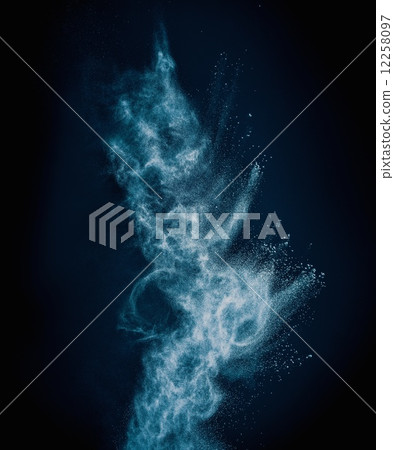 Blue powder exploding isolated on black Blue powder exploding isolated on black 12258097