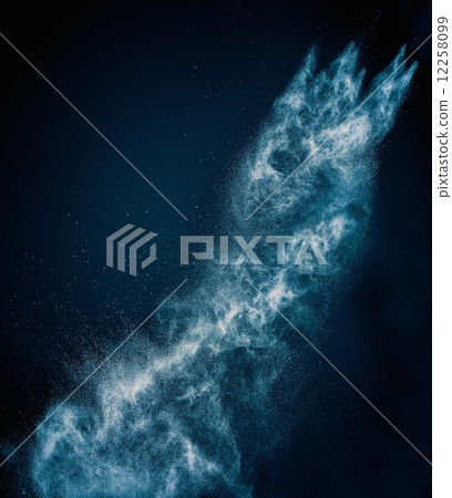 Blue powder exploding isolated on black Blue powder exploding isolated on black 12258099