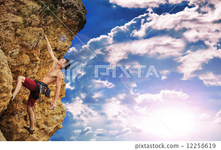 Climber and sunset Climber and sunset 12258619