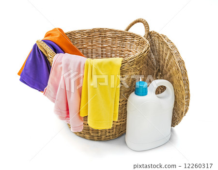 Colorful clothes in a laundry wooden basket on white background Colorful clothes in a laundry wooden basket on white background 12260317