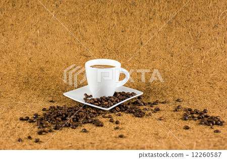 Coffe cup on brown background texture 12260587