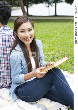 Young lady in a park. Young lady in a park. 12263645