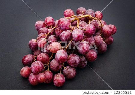 Red ripe grape over grey 12265551