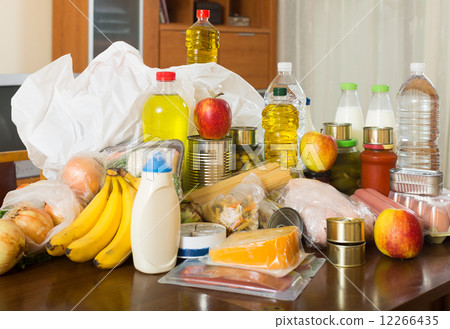 food purchases on table in home food purchases on table in home 12266435