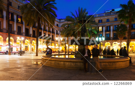 View of Placa Reial with fountain in evening. Barcelona 12266869