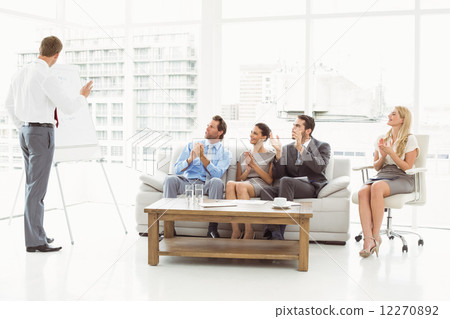Businessman giving presentation in office 12270892