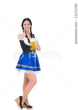 Pretty oktoberfest girl holding beer tankard 12272709