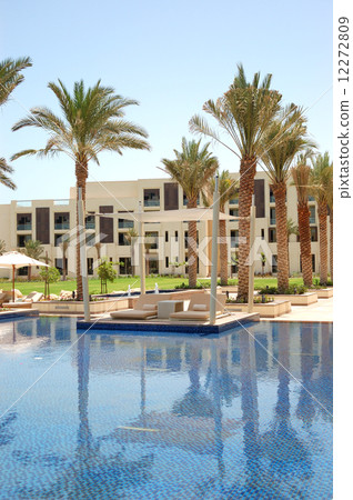 Hut at swimming pool of the luxury hotel, Saadiyat island, Abu D 12272809