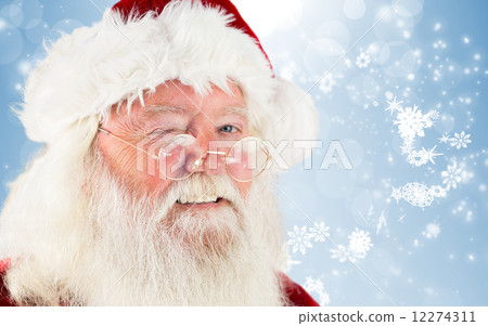 Composite image of santa claus winking Composite image of santa claus winking 12274311