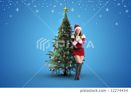 Composite image of pretty girl in santa costume holding gift box Composite image of pretty girl in santa costume holding gift box 12274454