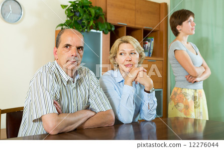 Adult daughter talking with parents 12276044