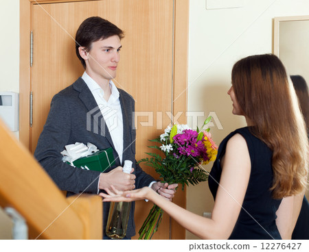 Guy with bunch of flowers and champagne 12276427