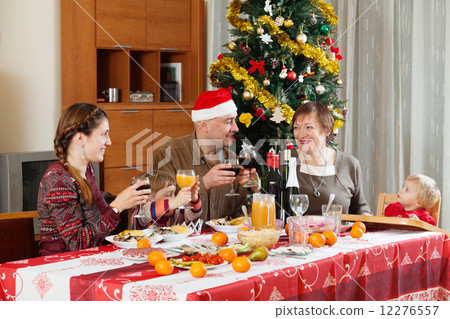 family of three generations celebrating New Year 12276557