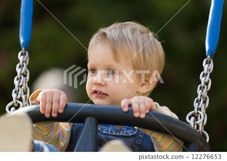 Child on swing 12276653