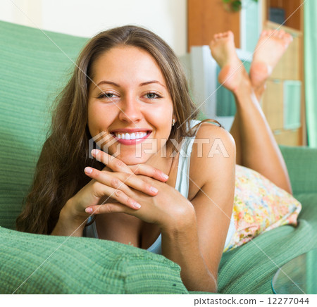 Portrait of happy woman at home 12277044