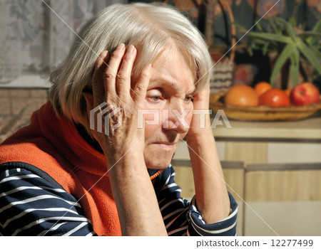 elderly woman thinks 12277499