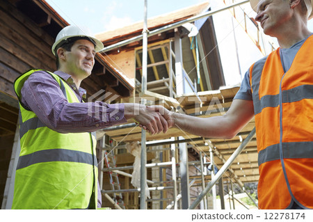 Architect Shaking Hands With With Builder Architect Shaking Hands With With Builder 12278174