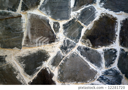 The wall of the large gray-brown stones close-up 12281720