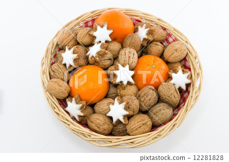 Basket with Walnuts, Tangerines and Cinnamon Stars 12281828
