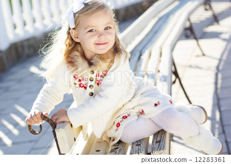 Little girl in an urban Little girl in an urban 12283361