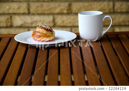 Cinnamon bread with coffee 12284129