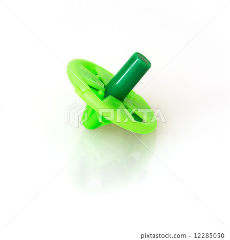Isolated green children whirligig 12285050