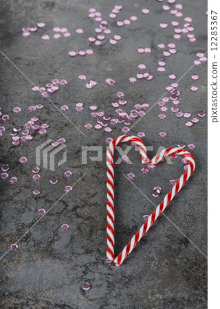 Christmas decorations - candy canes and sequins 12285367