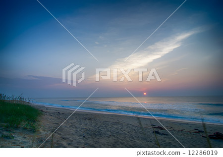 Beautiful empty beach at sunrise Beautiful empty beach at sunrise 12286019