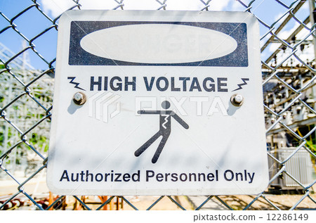 white and black danger warns trespassers away from this substati 12286149
