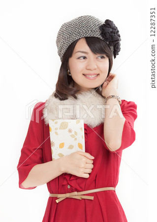 拿著書的中間婦女作為重要 拿著書的中間婦女作為重要 12287351